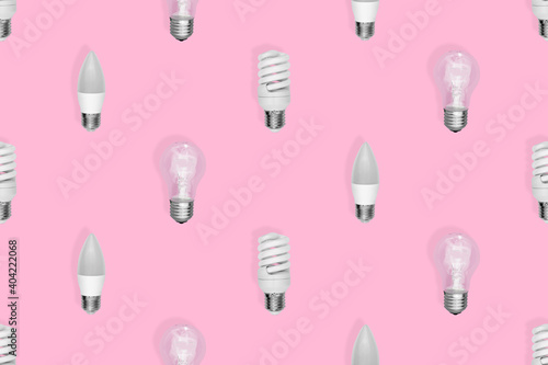 Light bulb seamless pattern. Lighting bulbs on a pink background.