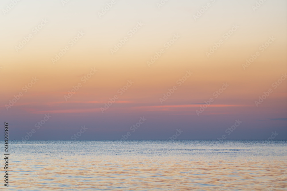 Fototapeta premium Summer sky over ocean horizon
