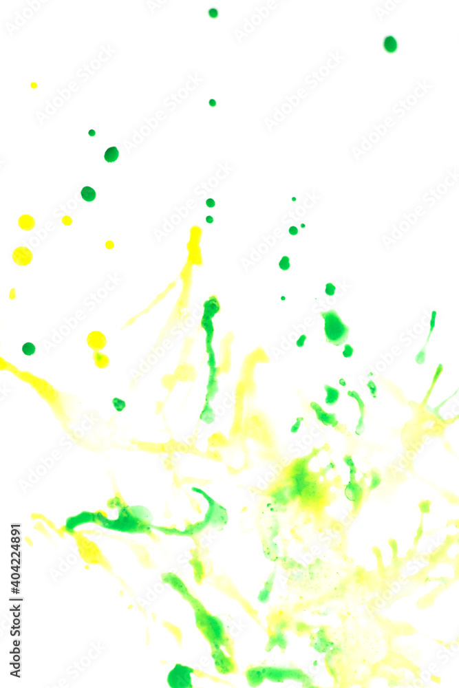 Yellow and green watercolor splashed onto white paper.