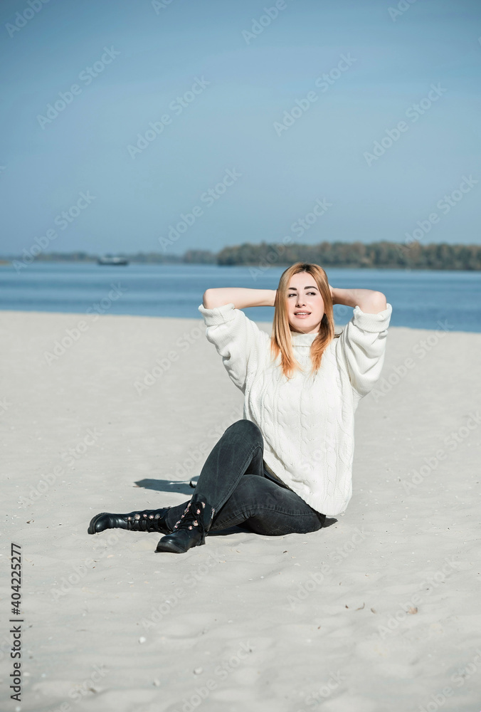 Happy portrait, Nice natural redhead plus size women at beach in spring time Happy portrait, Nice natural redhead plus size women at beach in spring time