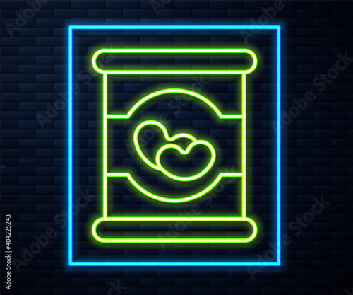 Glowing neon line Beans in can icon isolated on brick wall background. Vector.