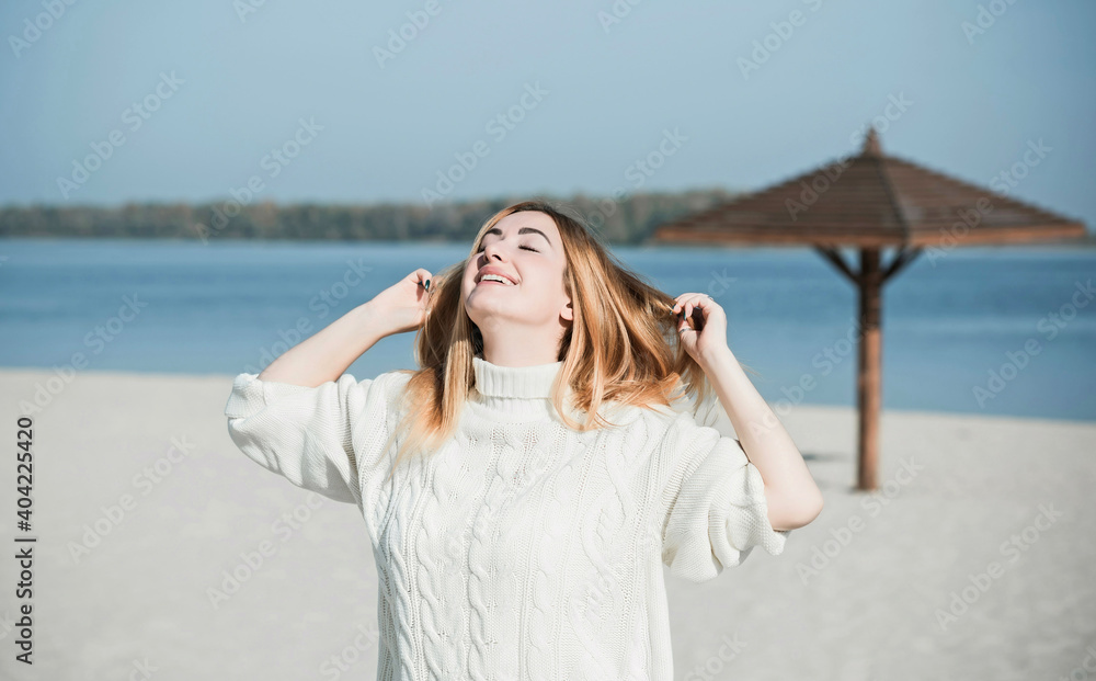 Happy portrait, Nice natural redhead plus size women at beach in spring time Happy portrait, Nice natural redhead plus size women at beach in spring time