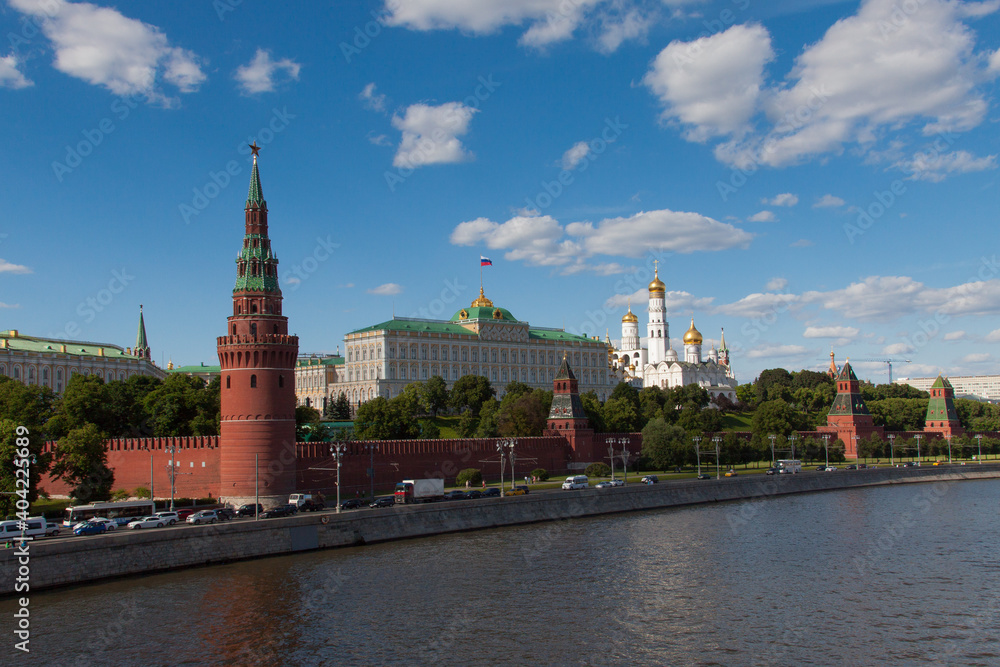 Moscow Kremlin on the Moscow River, Russia. Beautiful view of the famous center of Moscow in summer. Moscow city landscape in the evening.