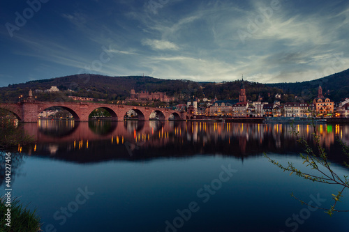 Panoramic view of Heidelberg's old town with the castle at dusk, Germany.
