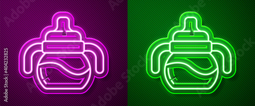 Glowing neon line Baby bottle icon isolated on purple and green background. Feeding bottle icon. Milk bottle sign. Vector.