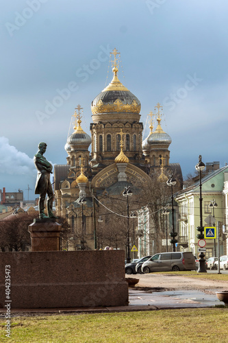 Russia, St. Petersburg-February 14, 2020: Lieutenant Schmidt Embankment. View of the Church of the Assumption of the Blessed Virgin Mary and the Krusenstern Monument photo