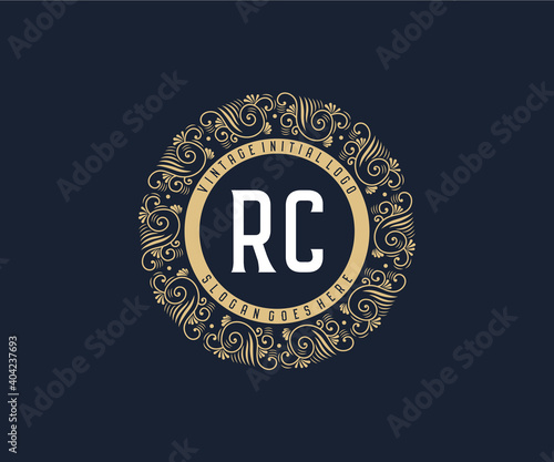Initial RC Antique retro luxury victorian calligraphic emblem logo with ornamental frame.