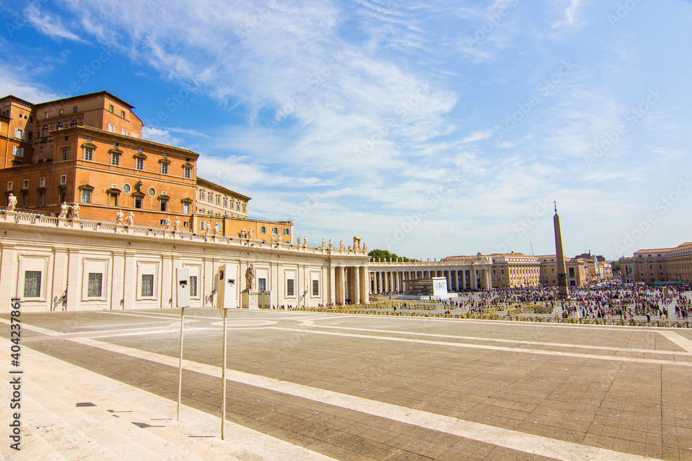St. Peter's Square in Vatican City, Rome. View from the St. Peter's Basilica, architectural masterpiece with Michelangelo's dome. Famous Italian landmark