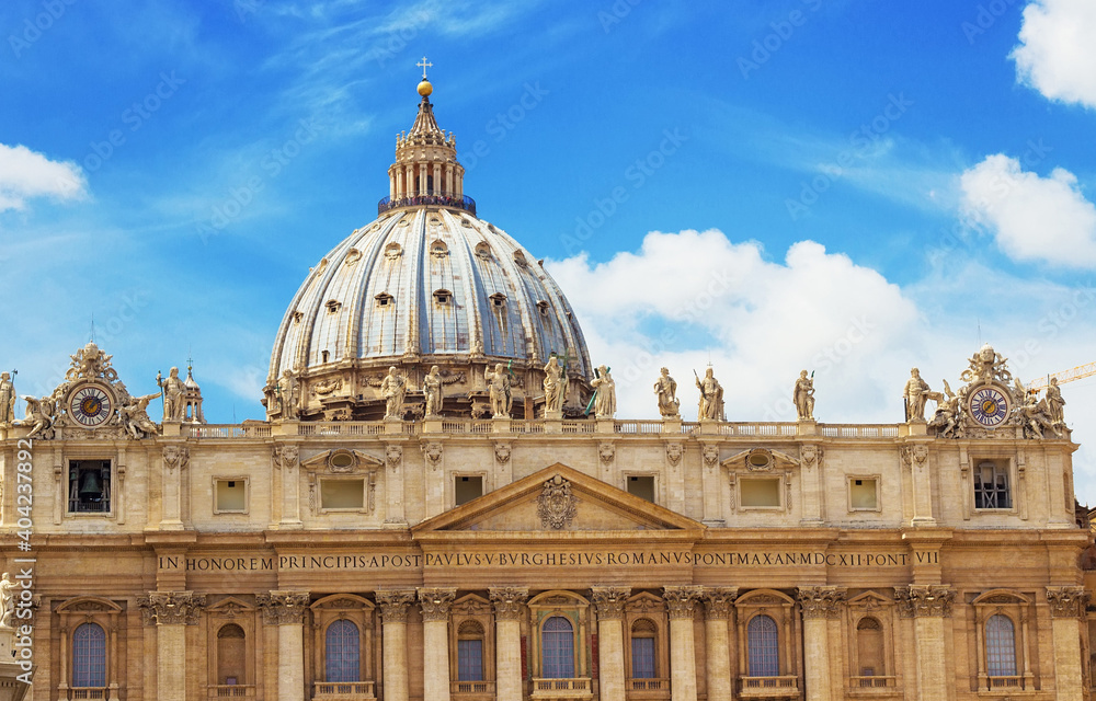 St. Peter's Basilica with Michelangelo's dome on the St. Peter's Square in Vatican City. Famous Italian landmark 