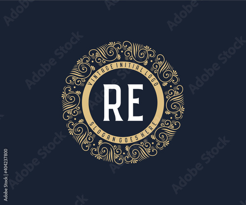 Initial RE Antique retro luxury victorian calligraphic emblem logo with ornamental frame.