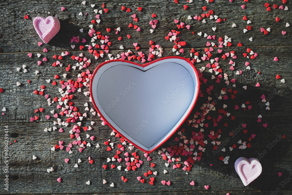 Happy valentines day. Open gift box in the shape of a heart with small hearts . Happy valentines day. Open gift box in the shape of a heart with small hearts .