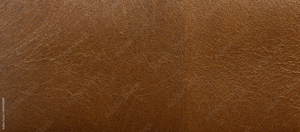 Fototapeta premium Leather brown background, leather material texture photo