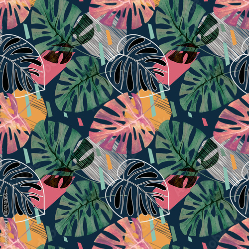 Seamless tropical pattern with palm leaves on dark blue background