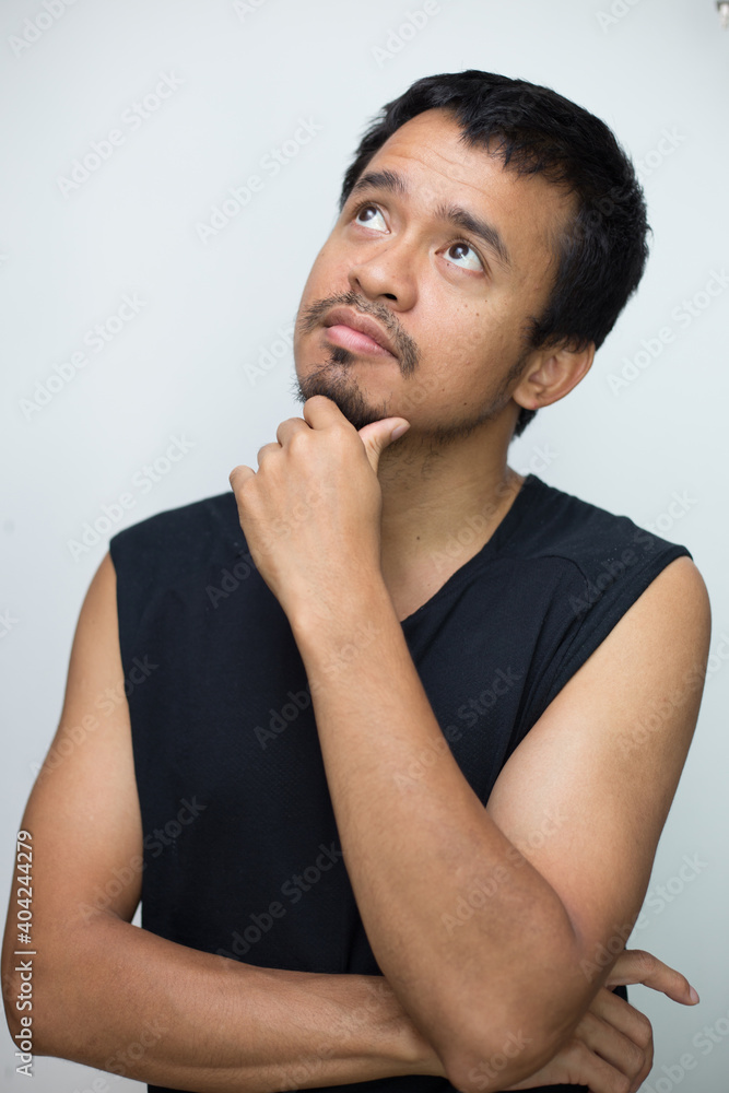 Portrait of handsome beard asian young thoughtful man Portrait of handsome beard asian young thoughtful man