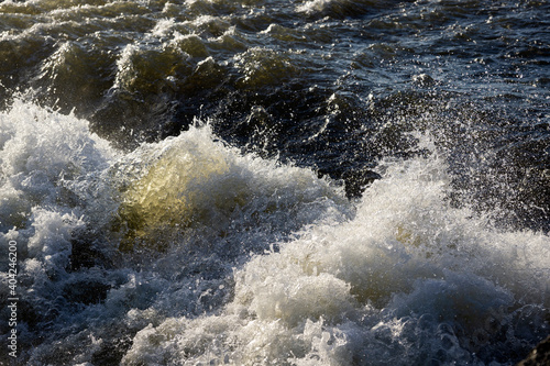Churning white water river rapids © simonXT2