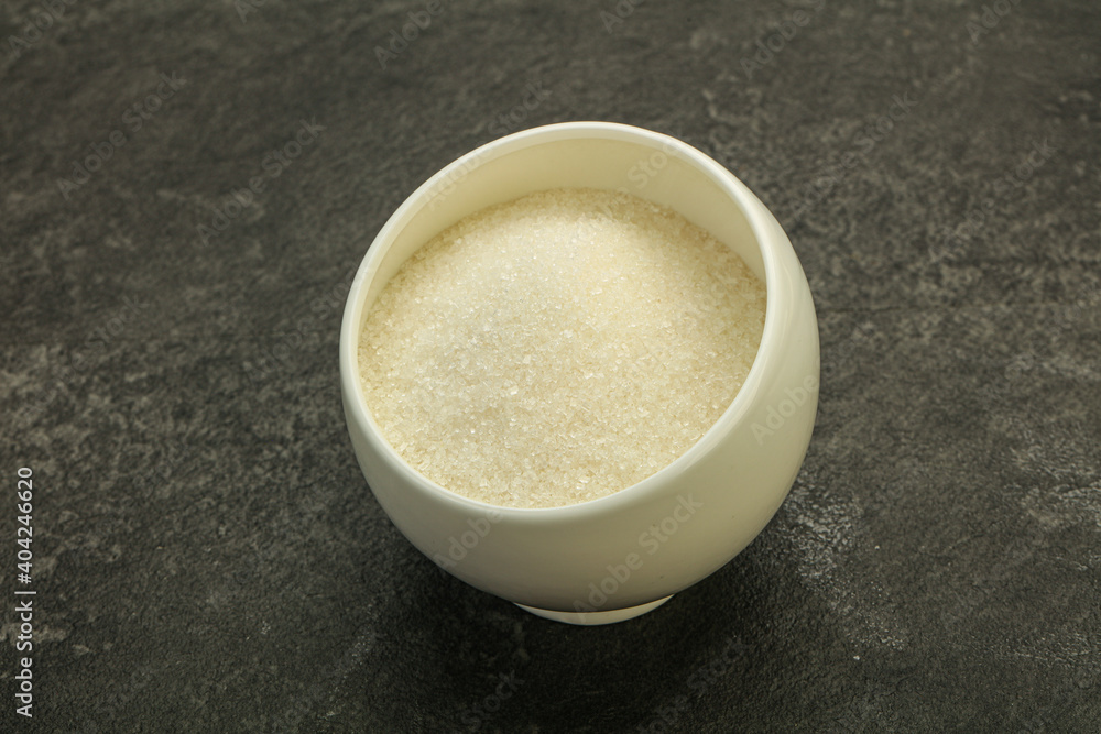 White sugar in the bowl White sugar in the bowl