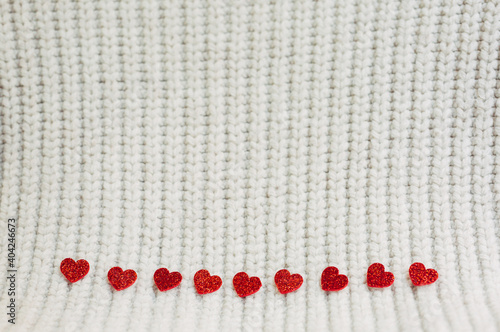 happy valentine day.Red heart.shiny red heart on a white knit background