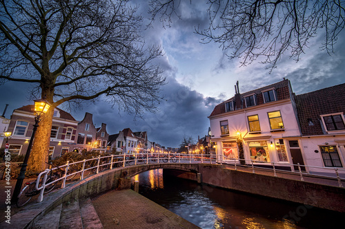 Canal with bridge and historic houses in the old city center of Haarlem, the Netherlands