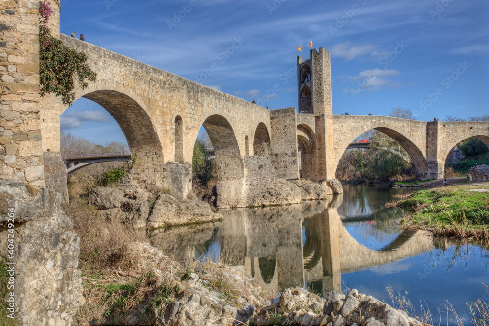Fluvia riverside with medieval bridge at bottom, Besalu, Spain