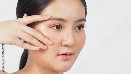 Beauty and skin concept. Young asian woman beauty face make up for skincare cosmetic and showing natural wellness soft and firm and ageless facial skin. she younger-looking or youthful. no retouch