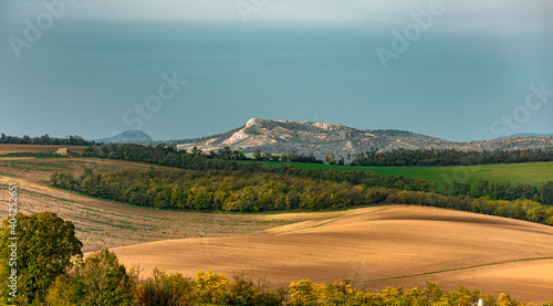 View of the Gerecse hills and fields in autumn colors. photo