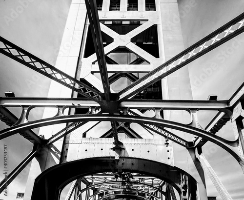 Looking up at the tower bridge in Sacramento in black and white  photo