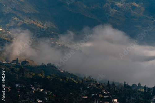  Colombian green mountains among the clouds at sunrise. Medellin  Colomia. January 10  2021