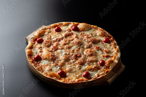 Juicy and got seafood pizza on a thin crispy dough, menu photo