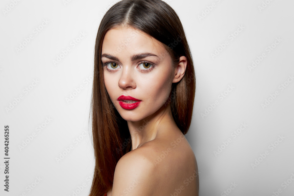 Woman with bare shoulders Confident look beautiful face charming look Woman with bare shoulders Confident look beautiful face charming look