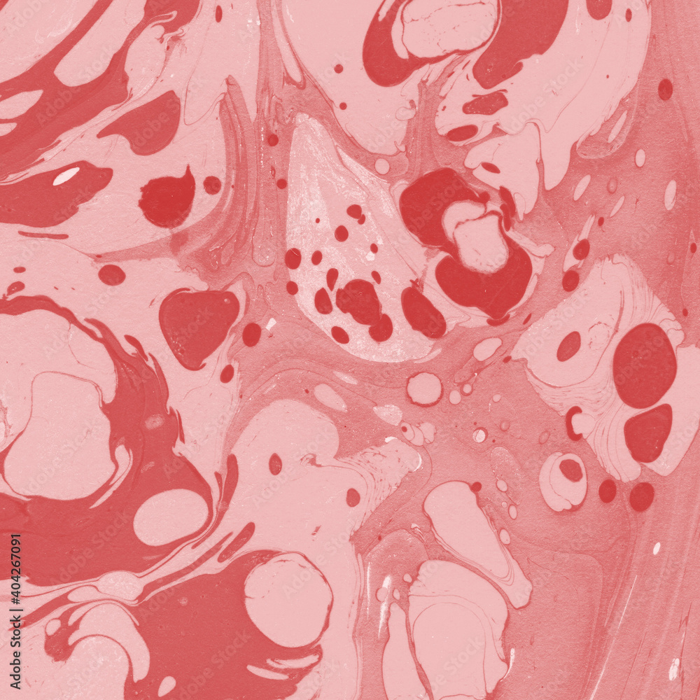 Red marble ink texture on watercolor paper background. Marble stone image. Bath bomb effect. Psychedelic biomorphic art.