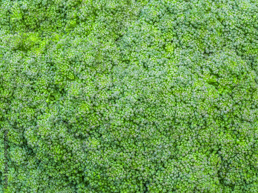 green nature background a broccoli flowers by closeup surface of fresh green cabbage flower buds for salad and healthy food ingredient from organic vegetable farming