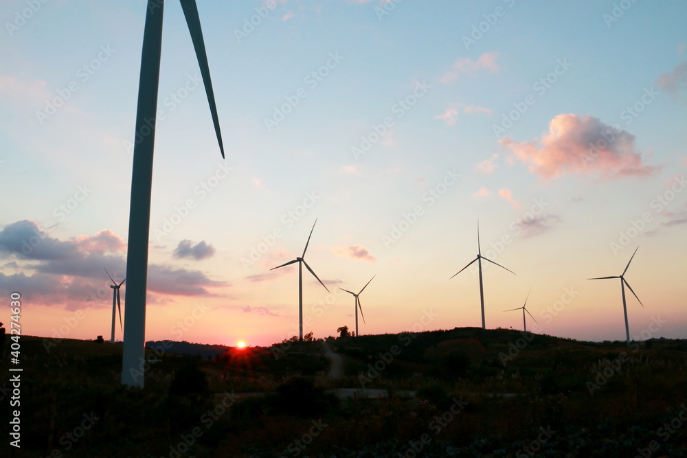 Fototapeta premium Silhouette of the wind turbine sunrise , Dan Khao Kho,Phetchabun, Thailand.