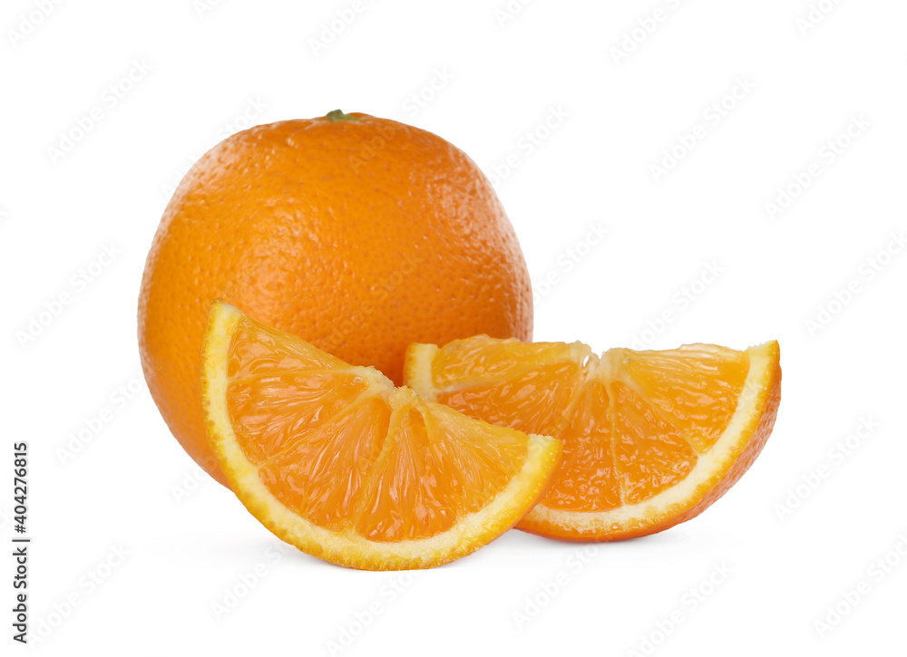 Cut and whole ripe oranges on white background Cut and whole ripe oranges on white background