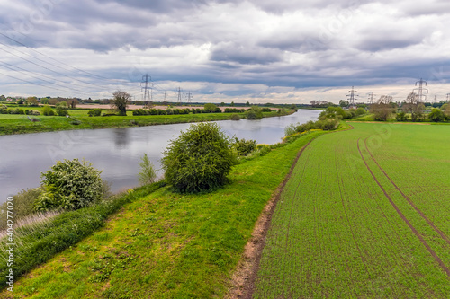 A view along the River Trent from the abandoned railway viaduct at Fledborough, Nottinghamshire in springtime