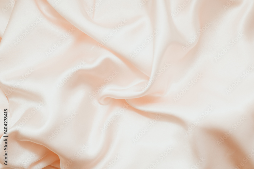 Powdery pink texture of silk, satin. Shiny fabric background. Powdery pink texture of silk, satin. Shiny fabric background.