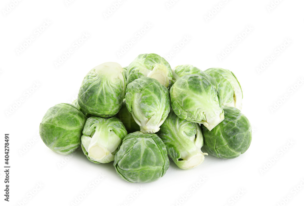 Pile of fresh Brussels sprouts isolated on white Pile of fresh Brussels sprouts isolated on white