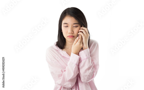 young asian woman holding mobile feel sleepy © TANABOON