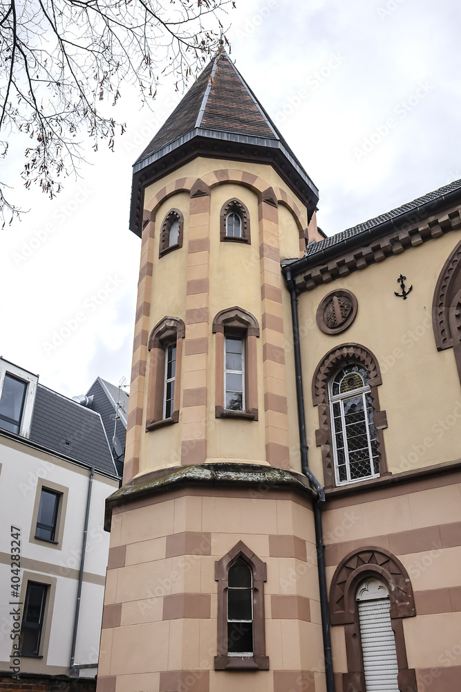 Fragments of old building of Circle Catholic Saint-Martin, created in 1880 - 72-meter-long building combines neo-Romanesque and neo-gothic styles. Colmar, Alsace, France.