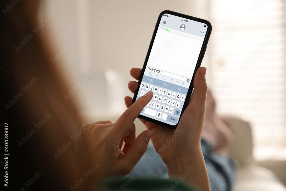 Woman sending message with text I Love You, closeup Woman sending message with text I Love You, closeup