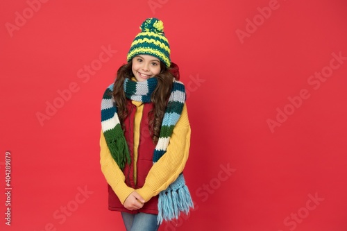 Warm smiles. take care of health. cheerful child wear warm winter clothes. seasonal kid fashion. stay cozy and comfortable. happy childhood. cold season look for teen girl. knitted clothing style