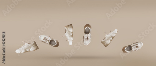 Trendy six pieces of women's sneakers of light color flying on a beige background. Stylish monochrome minimalism, levitation shoes, creative layout, summer sales, fashion blog. Banner with copy space.