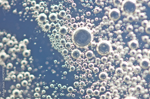Canvas Print Bubbles from soda water or champagne, beer or other liquid with air, oxygen or carbon dioxide bubbles