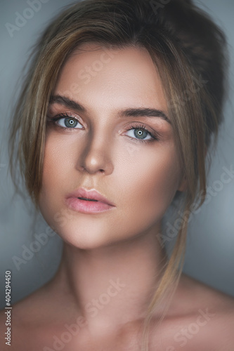 Young and stunning woman with a natural makeup