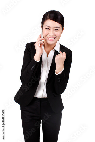 A Business woman using a cell phone 