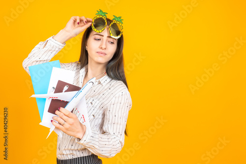 Traveler woman on a yellow ...