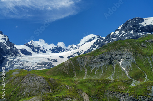 Mountain landscape along the road to Stelvio pass at summer. Glacier