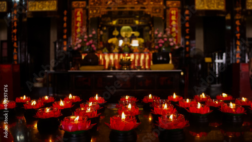Lighted candles in the Buddhist temple
