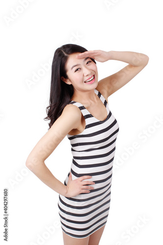 Portrait of a young woman in a striped dress © eastfenceimage