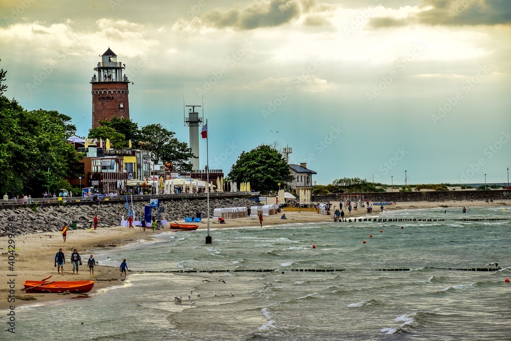 lighthouse on the beach - obrazy, fototapety, plakaty 