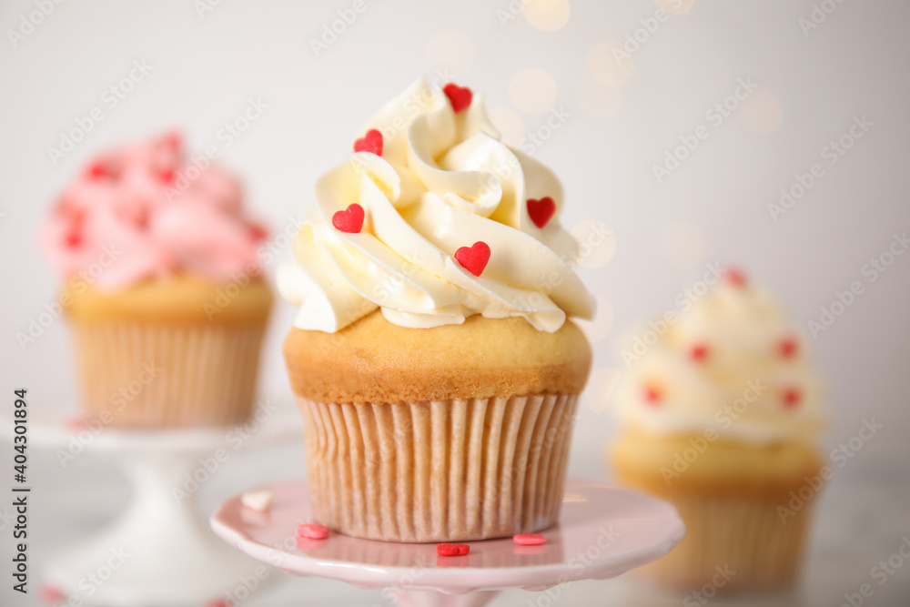 Tasty sweet cupcake on stand, closeup. Happy Valentine's Day
